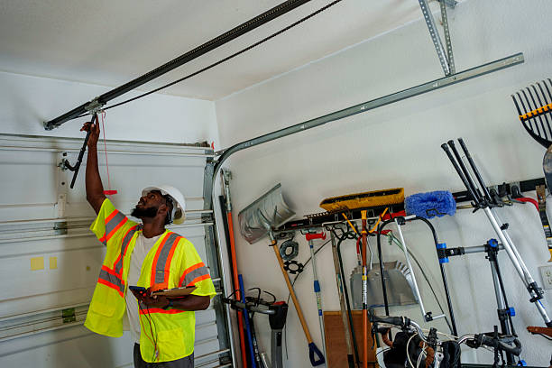Professional Garage Door Installation technician working in East Farmingdale, NY